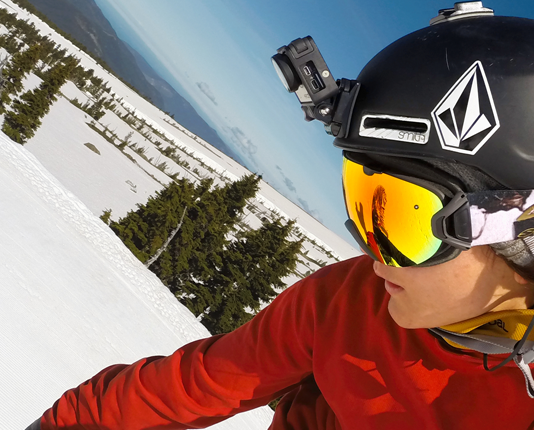 Skier with a GoPro Action Camera mounted to helmet